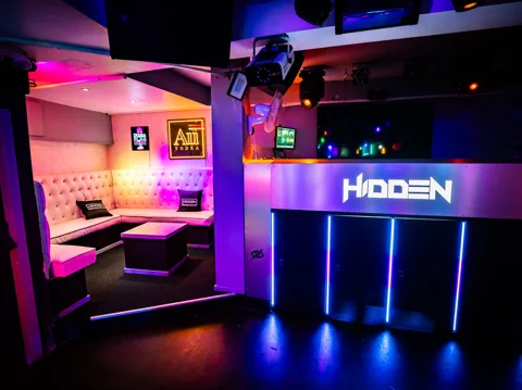 Hidden Burnley interior with magenta uplighting.